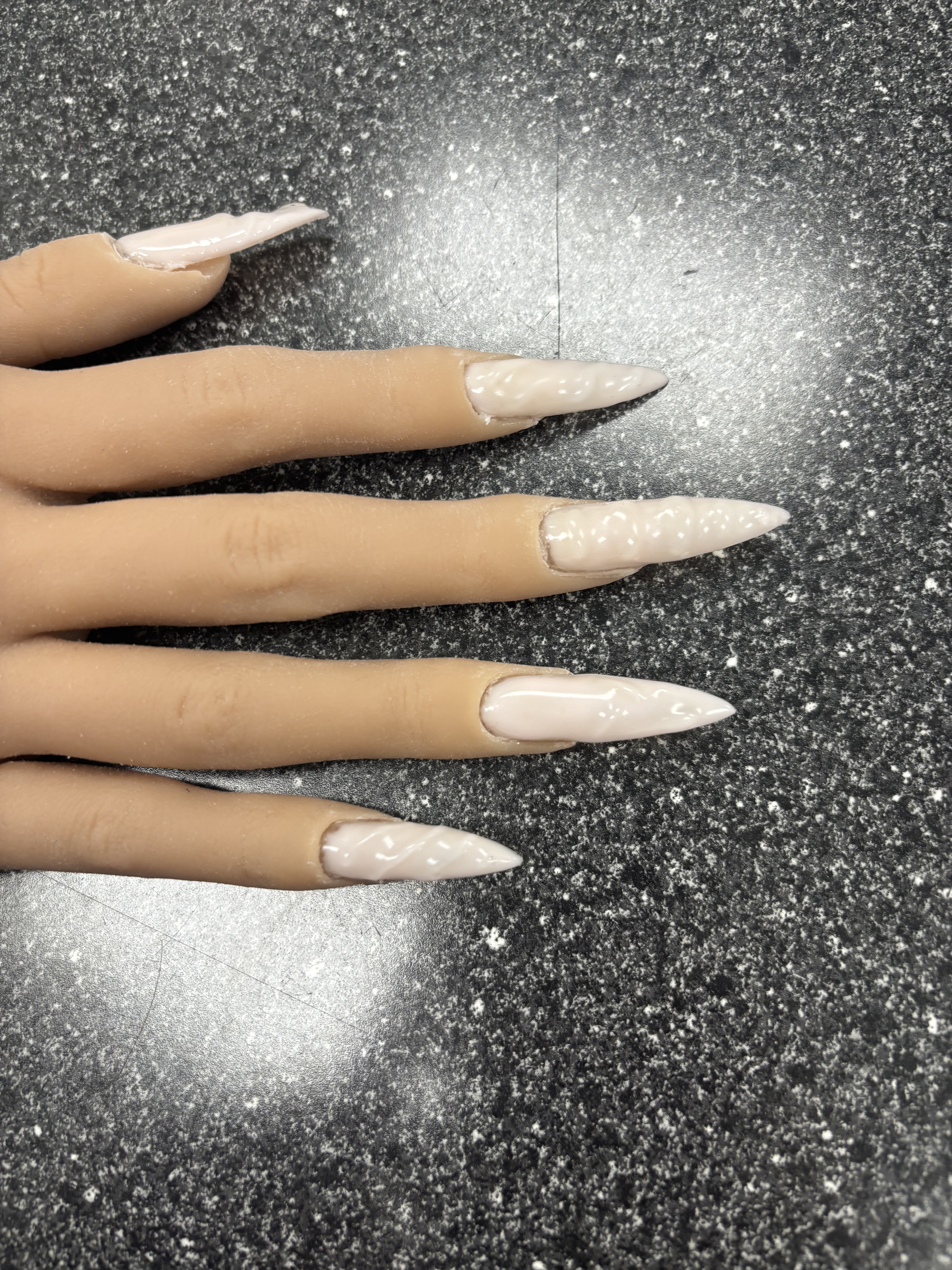 Nude stiletto acrylics